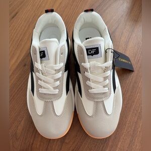Chic Italian-designed Cream and Black Sneakers